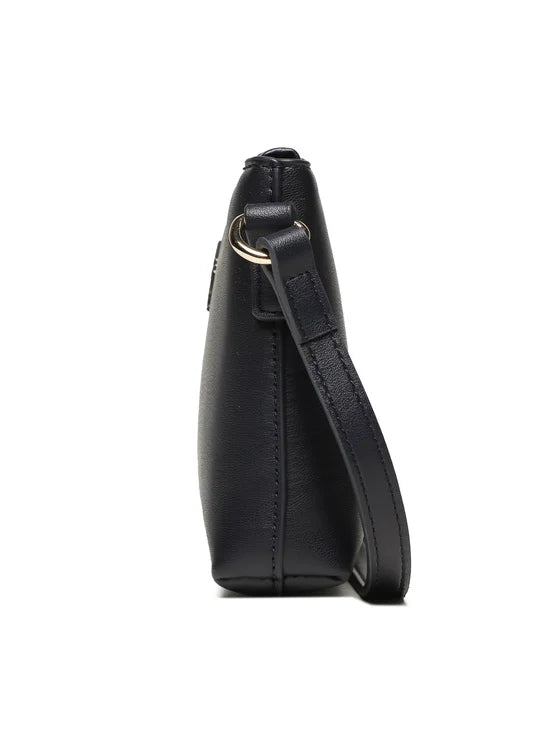 Tommy Hilfiger - Tommy Hilfiger TH Monogram Crossbody Bag - تومي هيلفيغر - حقيبة كروس بودي بتصميم حرفي TH من تومي هيلفيغر