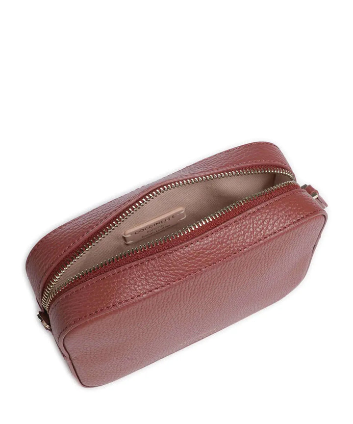 COCCINELLE - Coccinelle Pebbled Leather Crossbody Bag with Logo Strap - كوتشينيل - حقيبة كروس بودي من الجلد المحبب مع حزام شعار