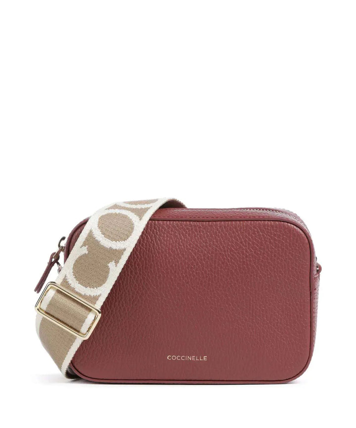 COCCINELLE - Coccinelle Pebbled Leather Crossbody Bag with Logo Strap - كوتشينيل - حقيبة كروس بودي من الجلد المحبب مع حزام شعار