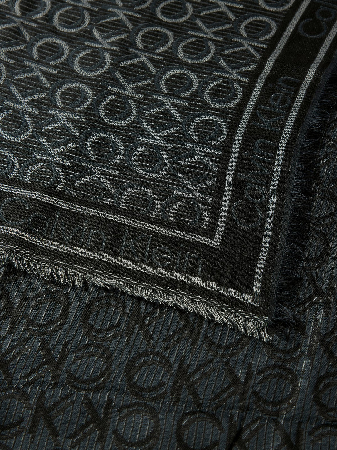Calvin Klein - Calvin Klein Jacquard Monogram Logo Scarf - كالفن كلاين - وشاح جاكار بشعار مونوغرام من كالفن كلاين