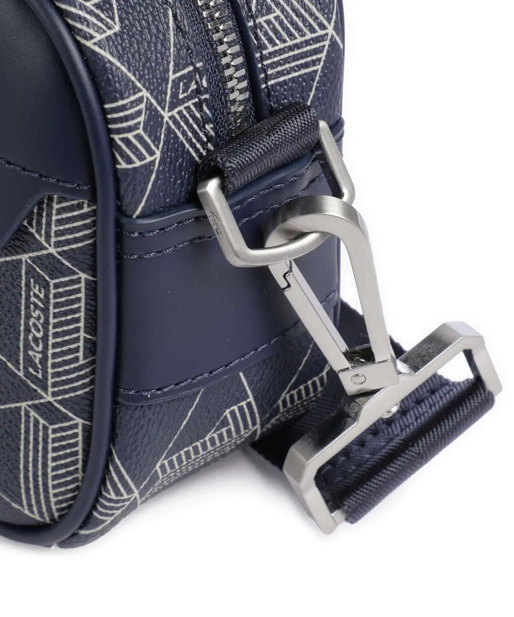 Lacoste - The Bend Monogram Crossbody Bag in Blue  - لاكوست - حقيبة كروس "ذا بيند مونوجرام" باللون الأزرق