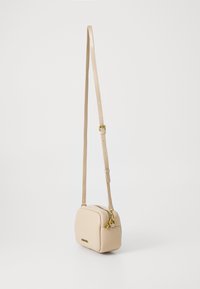 Just Cavalli RANGE PUFFY LOGO UP - Cross body bag - beige - جست كافالي حقيبة كروس بودي بشعار بارز ومنتفخ - بيج