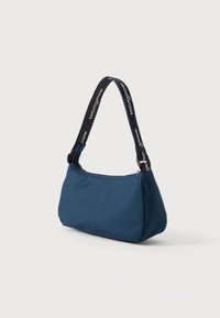 Tommy Jeans DAILY SHOULDER BAG - تومي جينز حقيبة كتف يومية